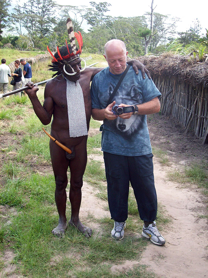 Villager and tourist in Baliem Valley