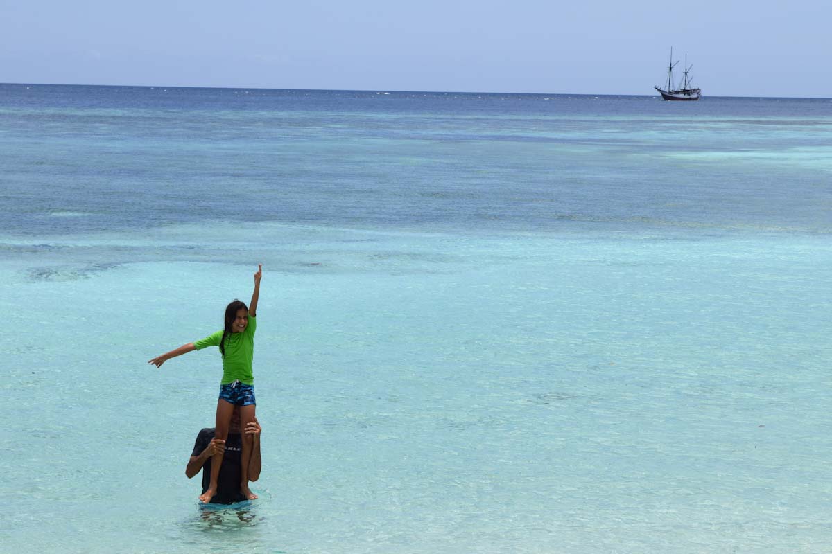 Liveaboard and child guest in the Ring of Fire